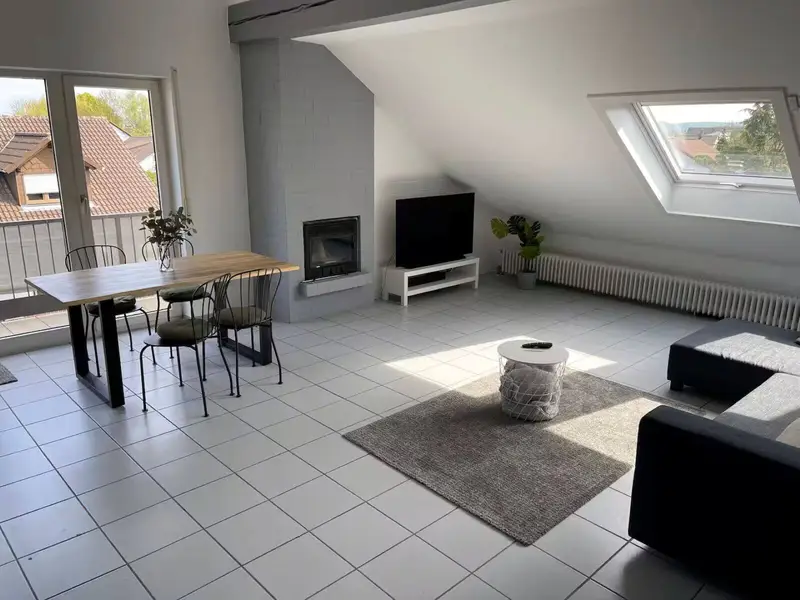 Loft Karlsdorf – Wohnzimmer mit Kamin
